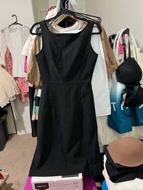 Elegant Level Eight Black Sleeveless Sheath Dress